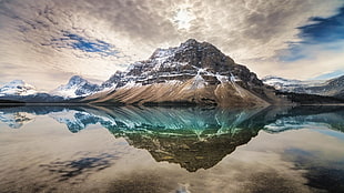 snow-capped mountain reflection on calm water under cloudy sky, landscape, nature, Canada, mountains