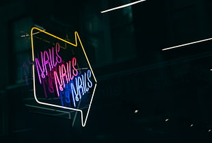 purple, pink, blue, and yellow LED sign