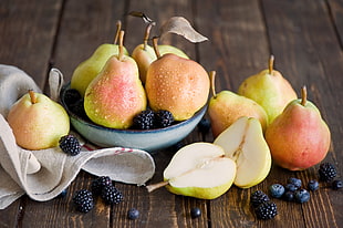 pears and blueberry fruits on bowl