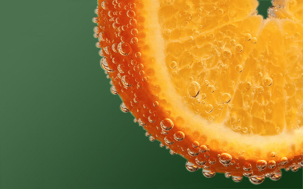 close photography of citrus fruit with water droplets HD wallpaper