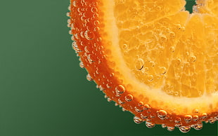 close photography of citrus fruit with water droplets