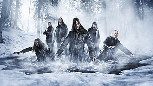 six man in black leather coat on snow digital wallpaper