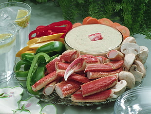 sliced vegetables surrounded on white cream filled glass bowl