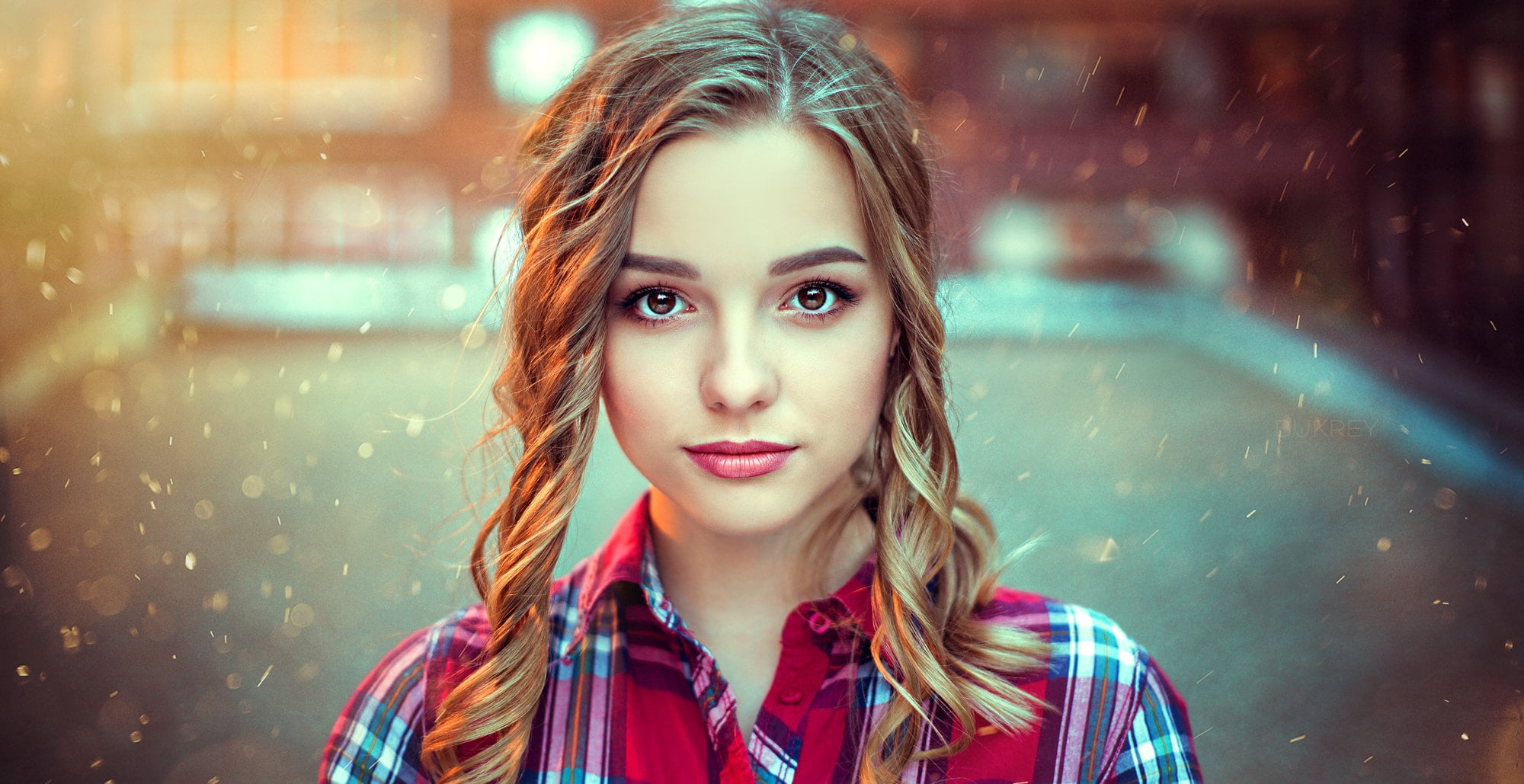 woman wearing red and white plaid collared shirt