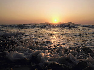 photography of ocean during sunset