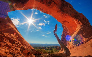 archway rock formation, desert, sky