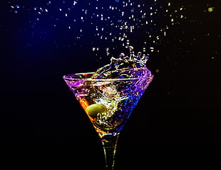 time lapse photography of filled martini glass