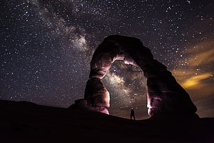 lanscape photography of dome rock bellow starry sky during night time HD wallpaper
