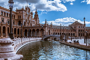 beige and white painted building next to white bridge and river, sevilla HD wallpaper