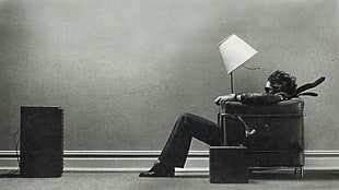 man sitting on sofa digital wallpaper, music