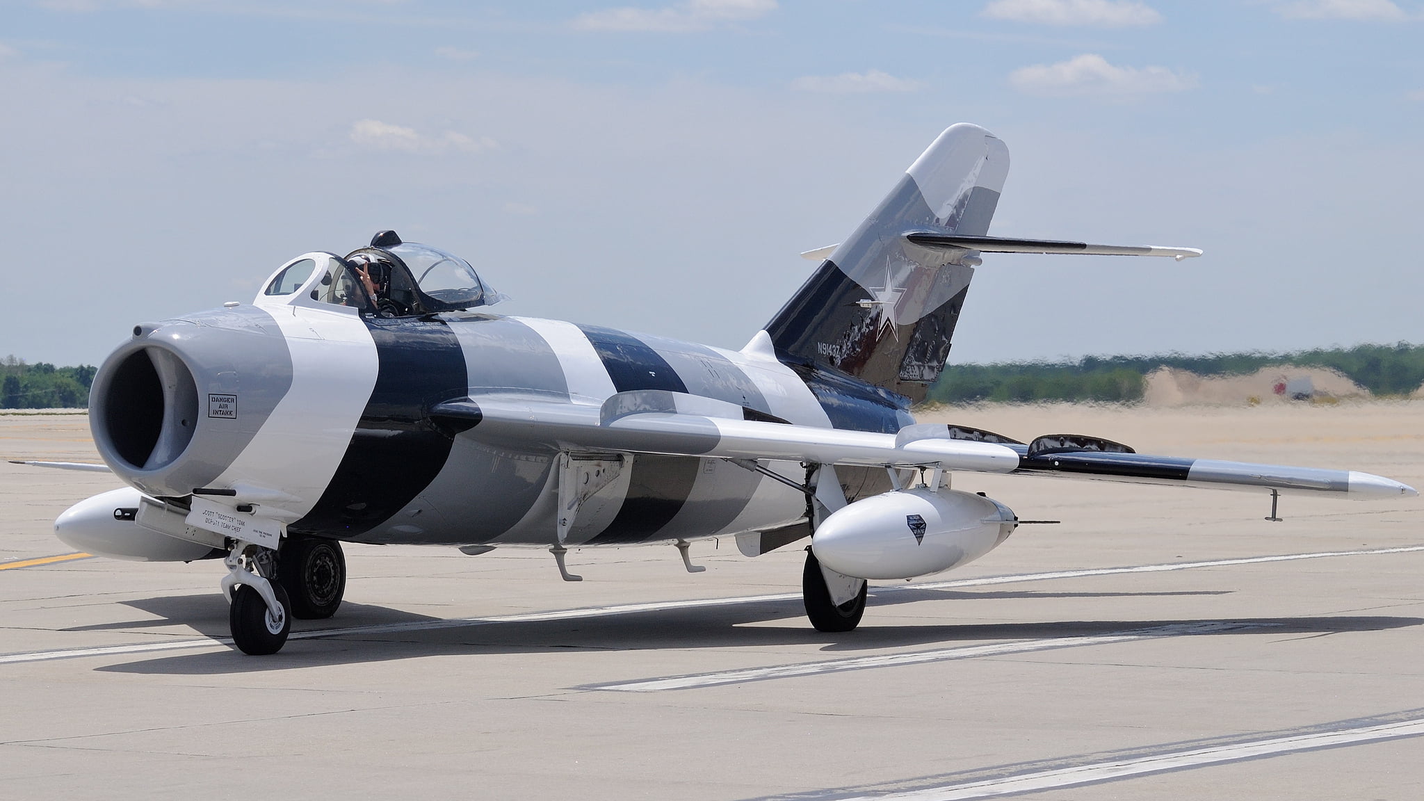 gray, white, and blue air craft