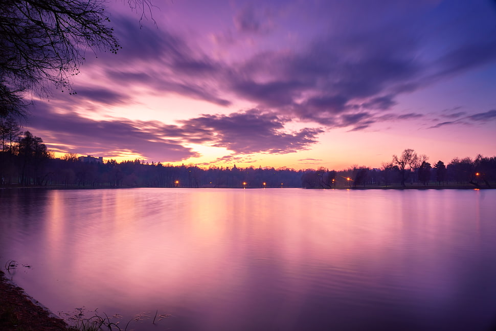 landscape photo of body of water under the purple and white sky HD wallpaper