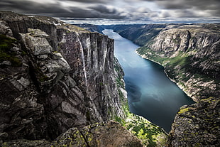 body of water between mountain cliff photo, kjerag, norway HD wallpaper