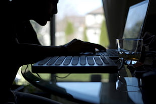 person typing at his laptop HD wallpaper