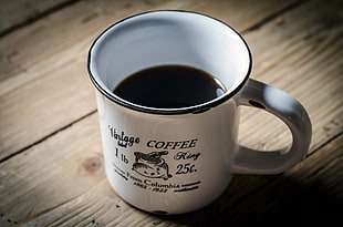 white ceramic mug filled with coffee