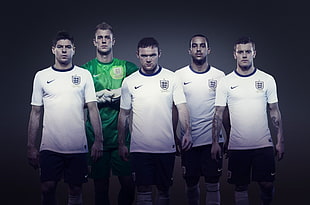 group of five man in soccer jersey