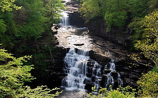 hi rise photography of waterfalls