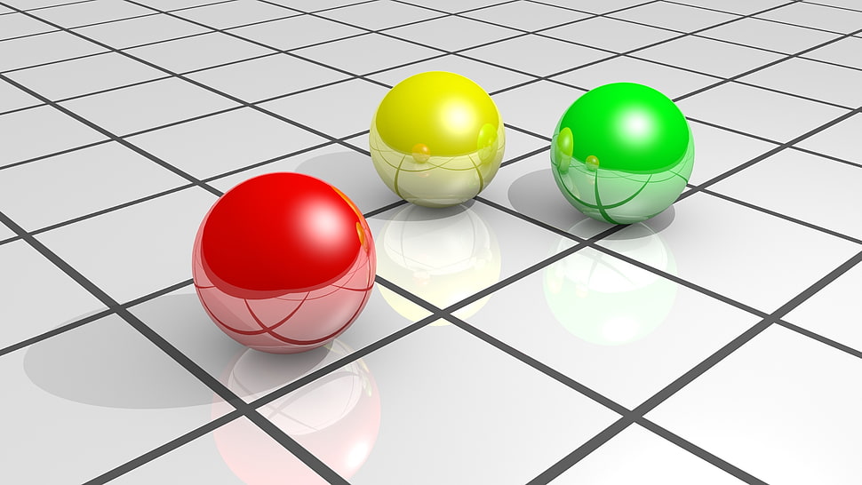 three yellow, red, and green balls HD wallpaper