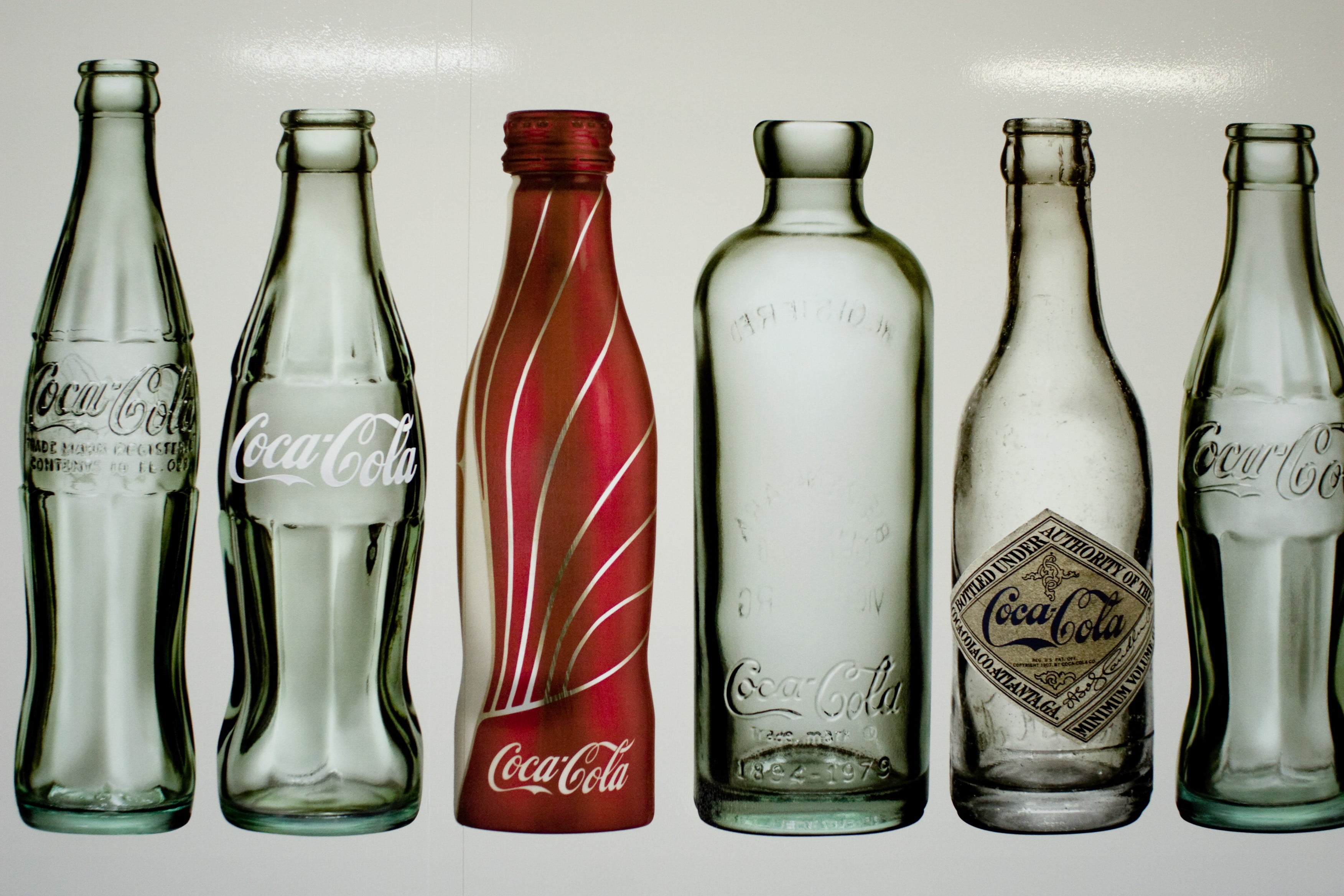 Five empty bottle of Coca-Cola HD wallpaper | Wallpaper Flare