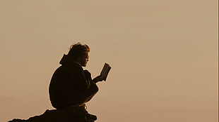 man holding book, Into the Wild, Christopher McCandless HD wallpaper