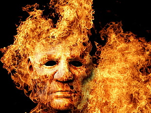 flaming face illustration with black background