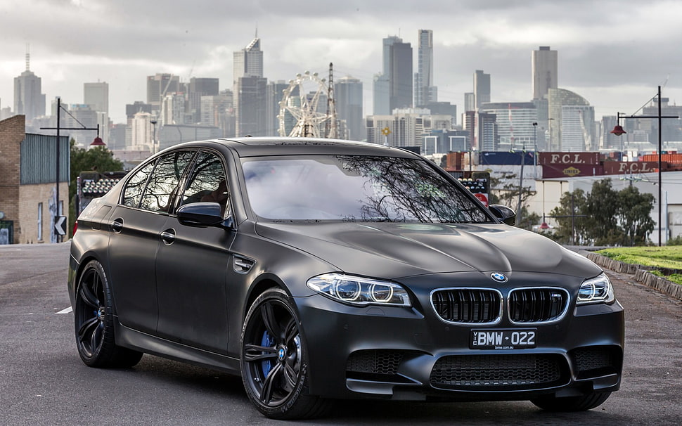 black BMW sedan HD wallpaper