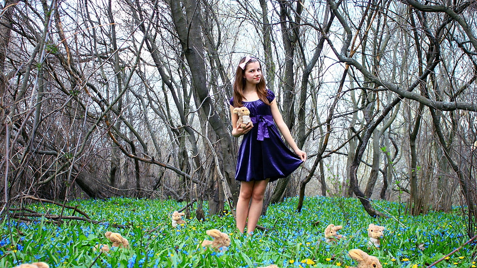 girl wearing purple satin dress standing in middle of forest HD wallpaper