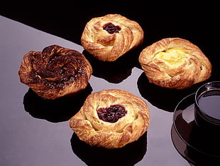 four baked pastries HD wallpaper