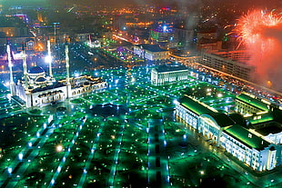 aerial photography of lighted city with fireworks