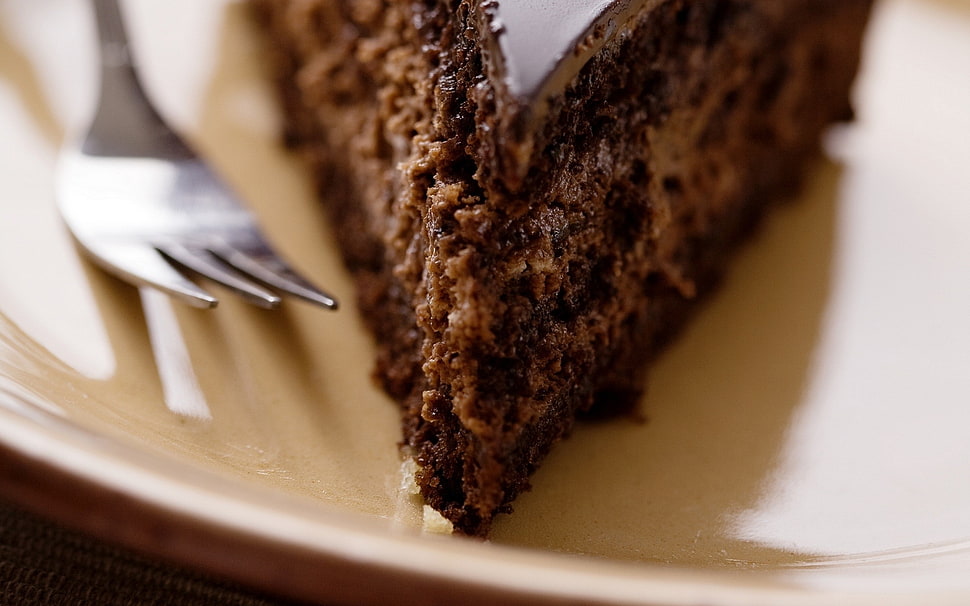 sliced chocolate cake on white ceramic plate HD wallpaper