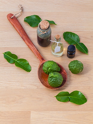 green fruits on brown wooden saptula HD wallpaper