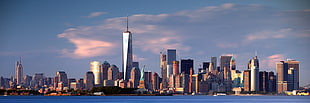 New York City skyline under blue sky