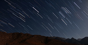 star shower, mountains, sky, stars, long exposure HD wallpaper