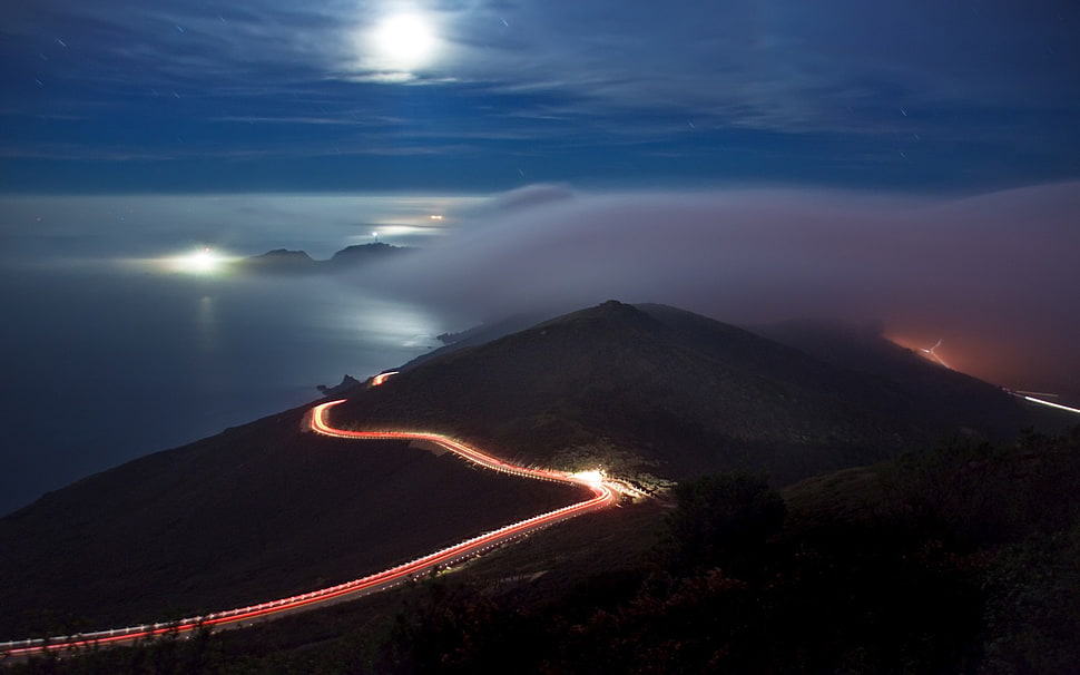 aerial photography of mountain, long exposure, road, traffic, clouds HD wallpaper