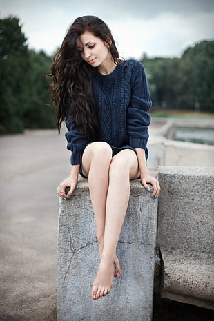 woman in black knitted sweater
