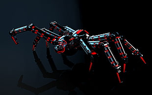 red and gray spider toy