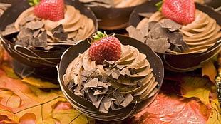 brown coffee ice cream with strawberry on top and chocolate bar HD wallpaper