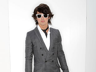 black haired man formal suit