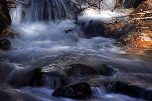 landscape photography of waterfalls during day time