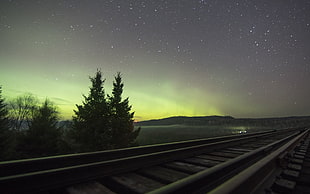 gray steel railroad, railway, aurorae