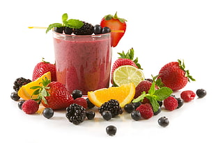 assorted fruits with glass vase
