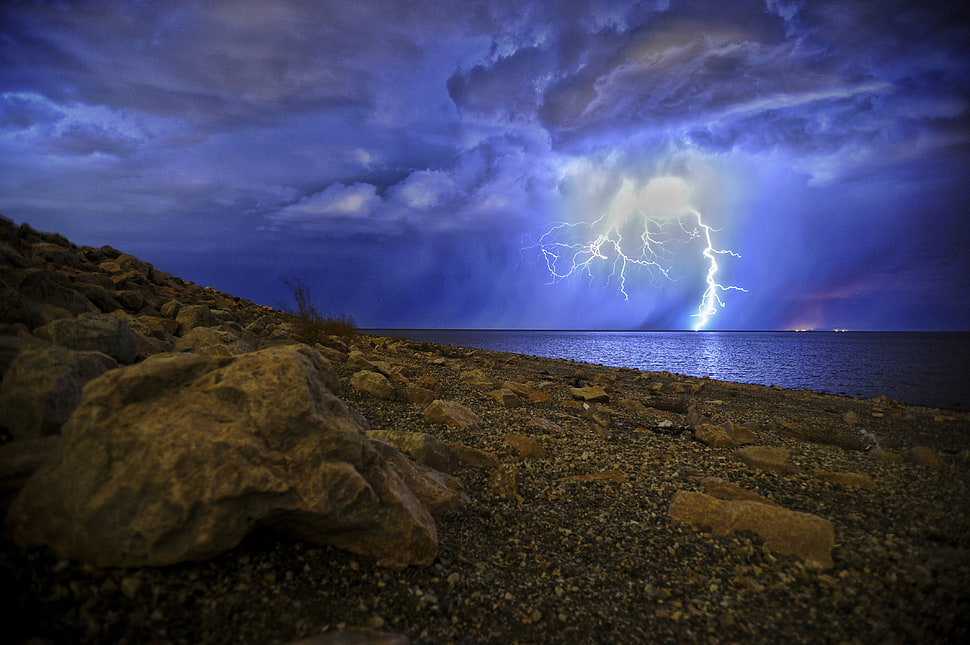 landscape photo of lightning on sea HD wallpaper