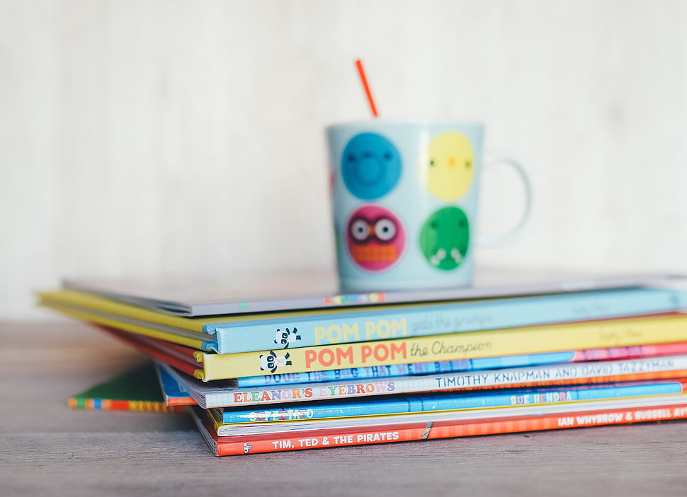 book lot and ceramic mug HD wallpaper