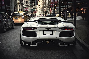 white Lamborghini Huracan on road