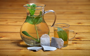 clear glass pitcher with mug