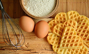 two chicken eggs near stainless steel whisk and flour HD wallpaper