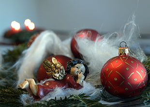cherub and bauble close-up photography