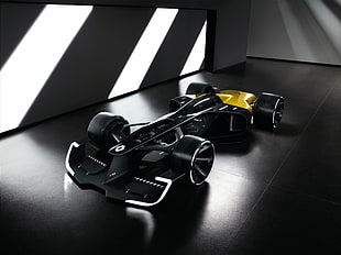 black and gray sports car under chassis inside black room