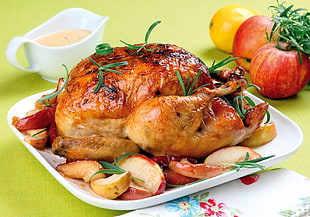 roasted chicken on white ceramic tray