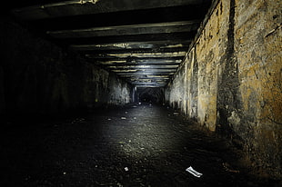 brown concrete wall, tunnel, dark, flashlight, night